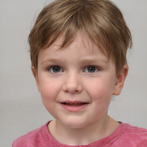 Joyful white child female with short  brown hair and grey eyes