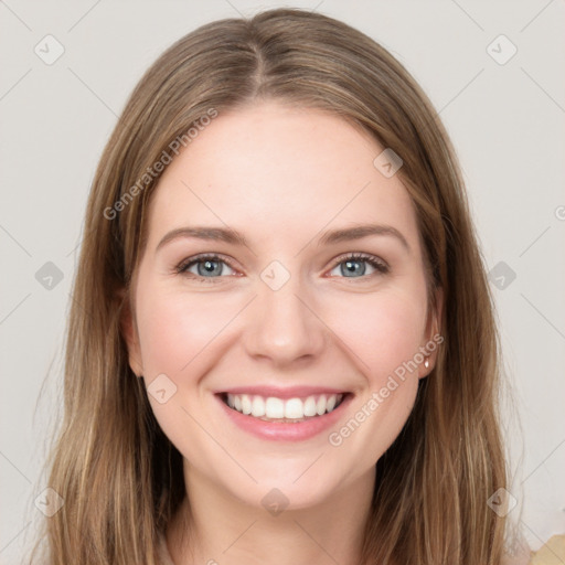 Joyful white young-adult female with long  brown hair and grey eyes