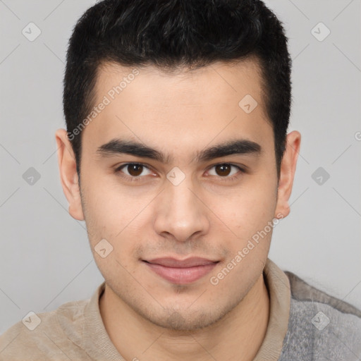 Joyful asian young-adult male with short  brown hair and brown eyes