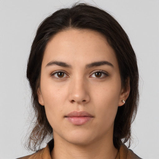 Neutral white young-adult female with medium  brown hair and brown eyes