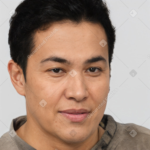 Joyful latino adult male with short  brown hair and brown eyes