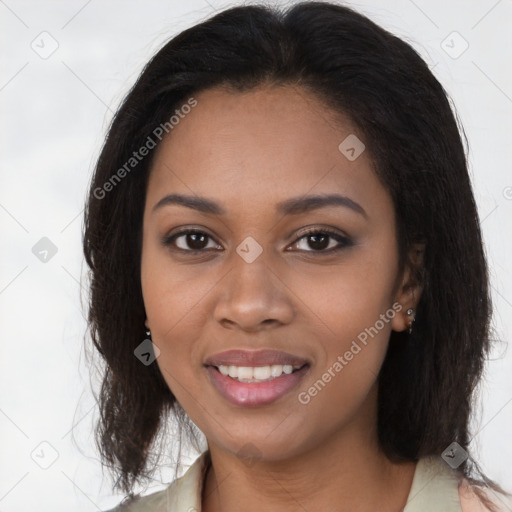 Joyful black young-adult female with medium  brown hair and brown eyes