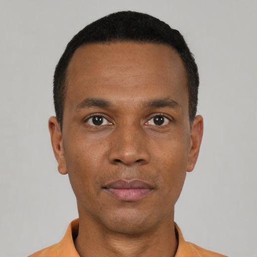 Neutral black young-adult male with short  black hair and brown eyes
