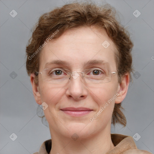 Joyful white adult female with medium  brown hair and blue eyes