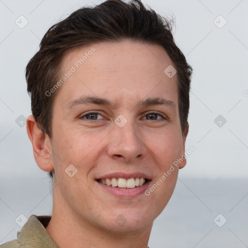 Joyful white adult female with short  brown hair and grey eyes