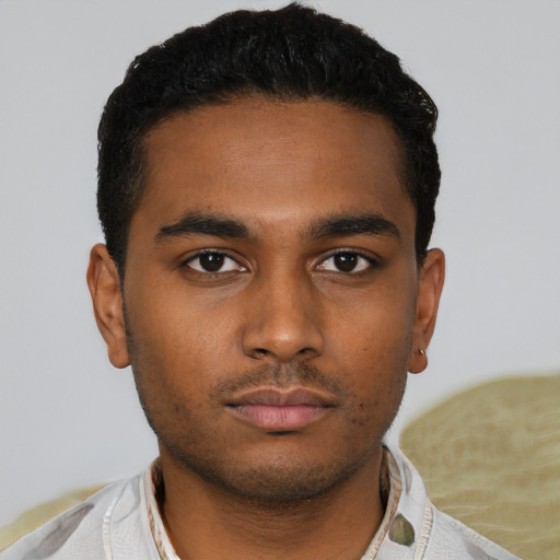 Neutral black young-adult male with short  brown hair and brown eyes