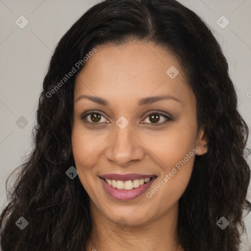 Joyful latino young-adult female with long  brown hair and brown eyes