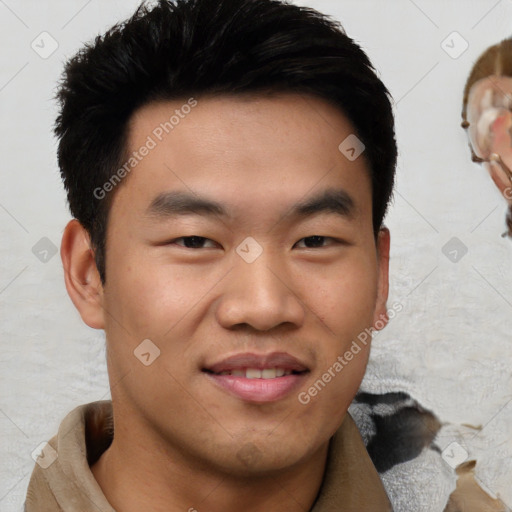 Joyful asian young-adult male with short  black hair and brown eyes