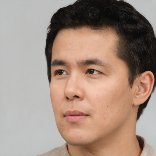 Neutral asian young-adult male with short  black hair and brown eyes