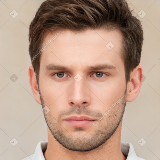 Neutral white young-adult male with short  brown hair and brown eyes