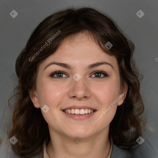 Joyful white young-adult female with medium  brown hair and green eyes