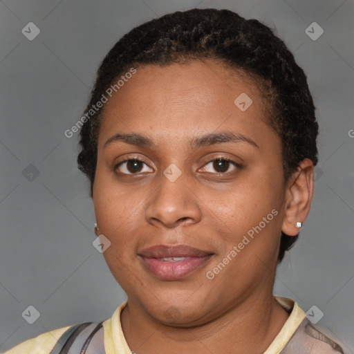Joyful black young-adult female with short  brown hair and brown eyes