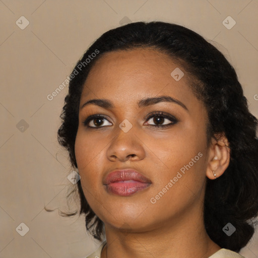 Joyful black young-adult female with medium  black hair and brown eyes