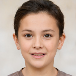 Joyful white child female with short  brown hair and brown eyes