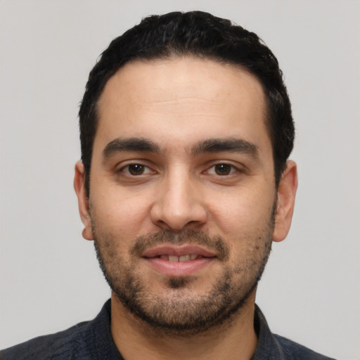 Neutral latino young-adult male with short  black hair and brown eyes