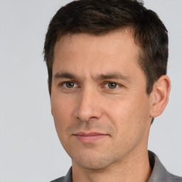 Neutral white adult male with short  brown hair and brown eyes