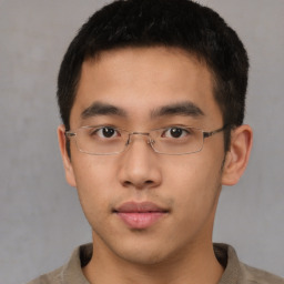 Neutral asian young-adult male with short  brown hair and brown eyes