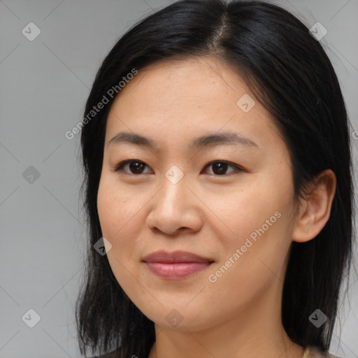 Joyful asian young-adult female with medium  black hair and brown eyes