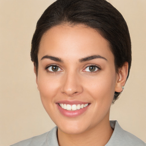 Joyful white young-adult female with medium  brown hair and brown eyes