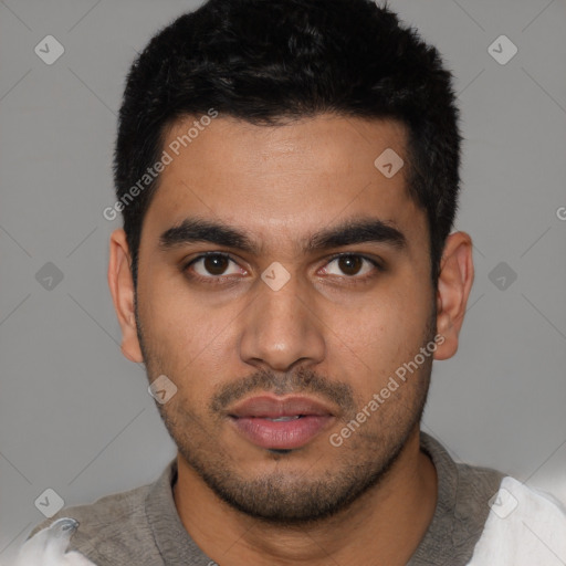 Neutral latino young-adult male with short  black hair and brown eyes