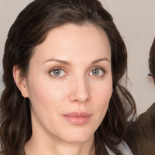 Neutral white young-adult female with medium  brown hair and grey eyes