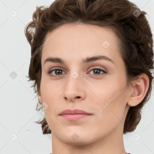 Joyful white young-adult female with medium  brown hair and green eyes