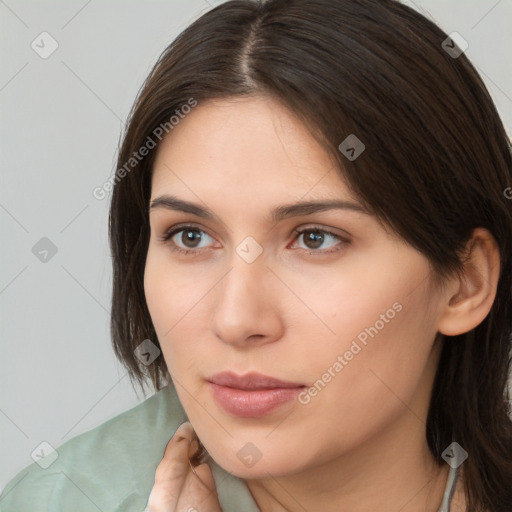 Neutral white young-adult female with medium  brown hair and brown eyes