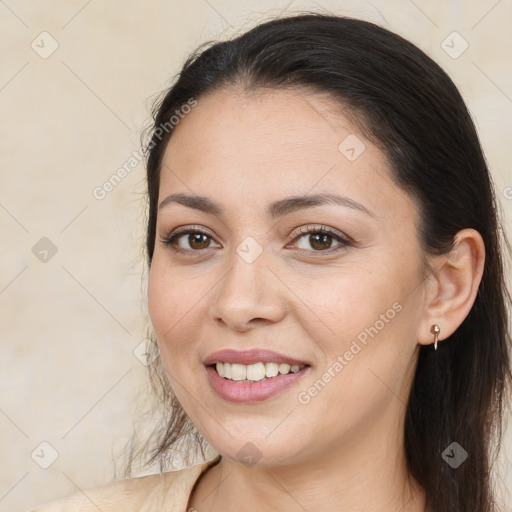 Joyful white young-adult female with long  brown hair and brown eyes