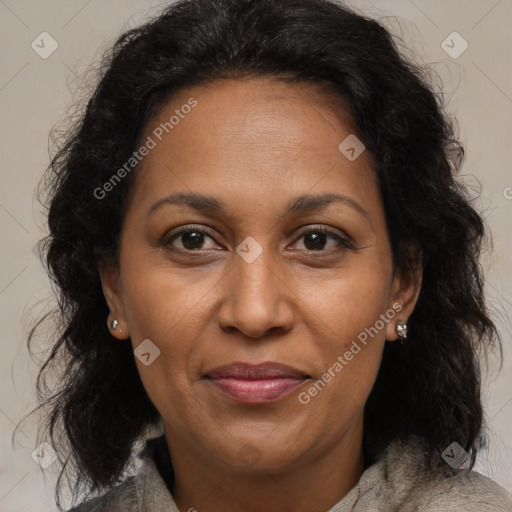 Joyful black adult female with medium  brown hair and brown eyes