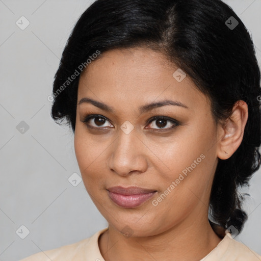 Joyful latino young-adult female with medium  brown hair and brown eyes