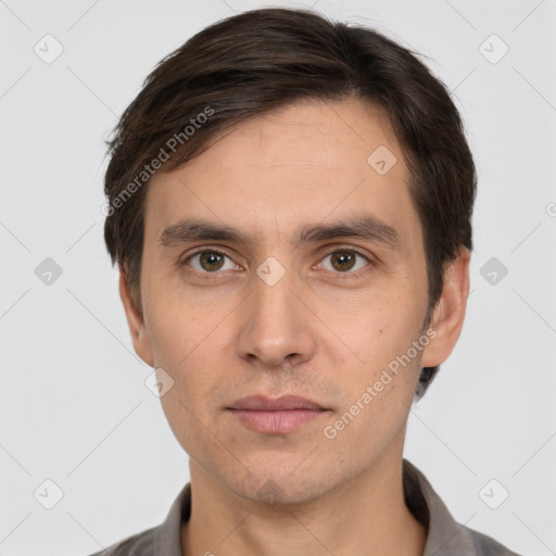 Neutral white adult male with short  brown hair and brown eyes