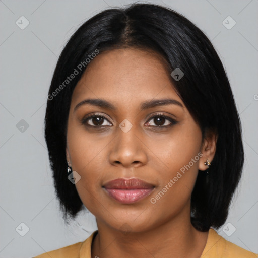 Joyful black young-adult female with medium  black hair and brown eyes