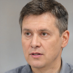 Neutral white adult male with short  brown hair and brown eyes