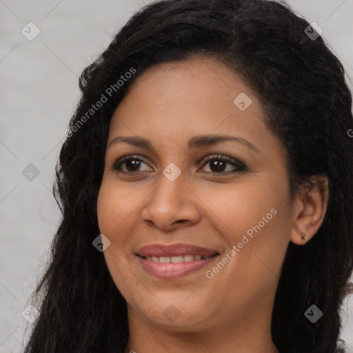 Joyful black young-adult female with long  brown hair and brown eyes