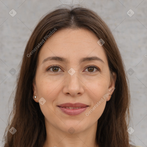 Joyful white adult female with medium  brown hair and brown eyes