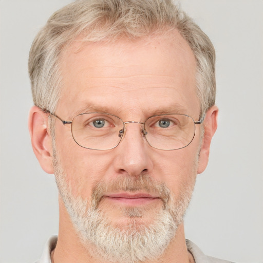 Neutral white middle-aged male with short  gray hair and grey eyes