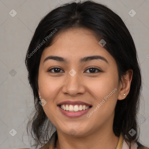 Joyful asian young-adult female with medium  brown hair and brown eyes