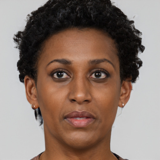 Neutral black young-adult female with short  black hair and brown eyes