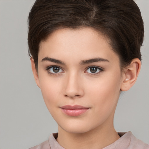 Neutral white young-adult female with short  brown hair and brown eyes