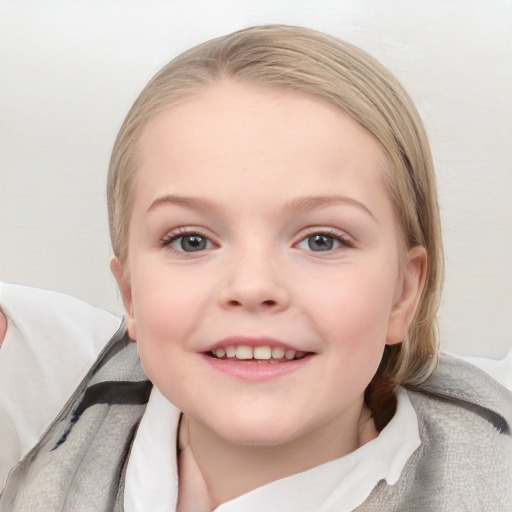 Joyful white child female with medium  brown hair and blue eyes