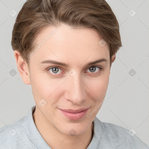 Joyful white young-adult female with short  brown hair and grey eyes