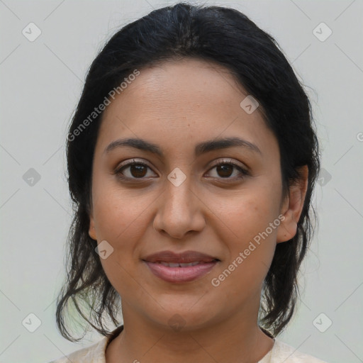 Joyful latino young-adult female with medium  brown hair and brown eyes