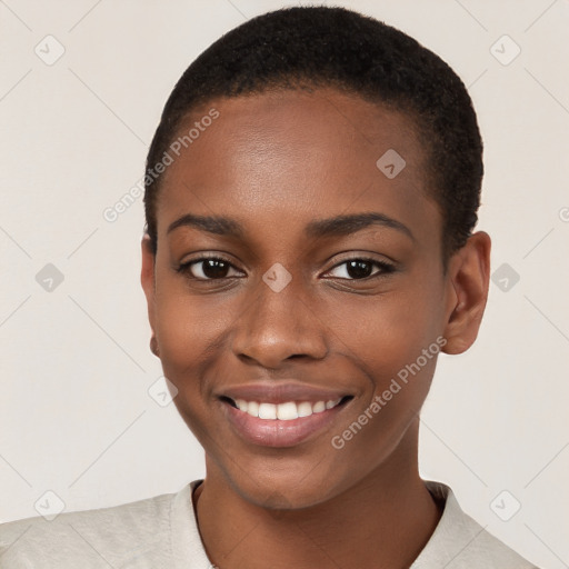 Joyful black young-adult female with short  black hair and brown eyes