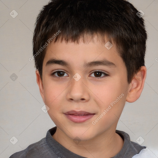 Joyful white child male with short  brown hair and brown eyes