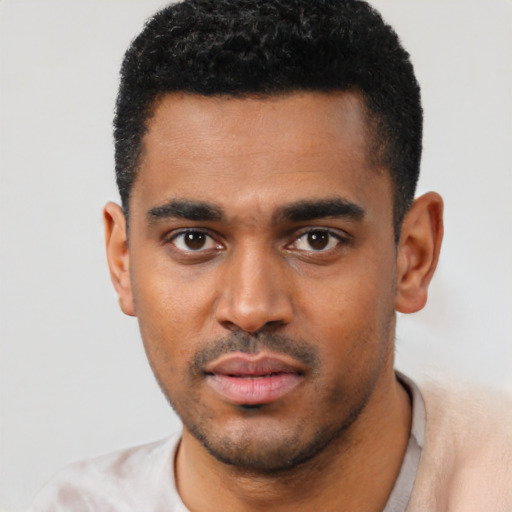 Neutral black young-adult male with short  black hair and brown eyes