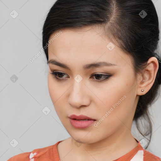 Neutral white young-adult female with medium  brown hair and brown eyes