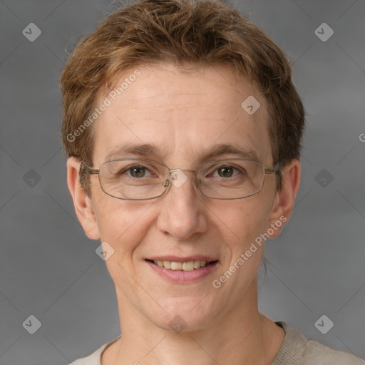 Joyful white adult female with short  brown hair and grey eyes