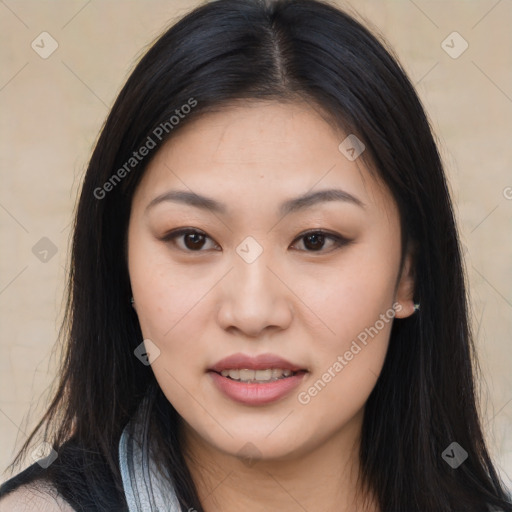 Joyful asian young-adult female with long  brown hair and brown eyes