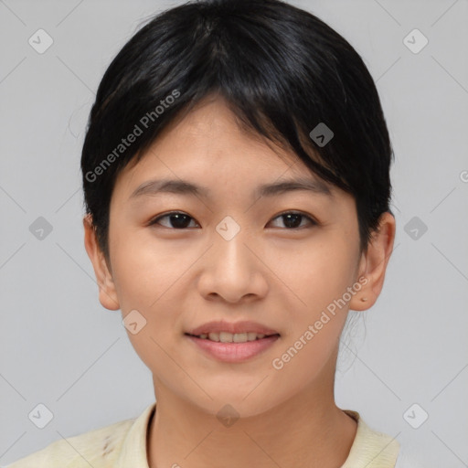Joyful asian young-adult female with short  brown hair and brown eyes