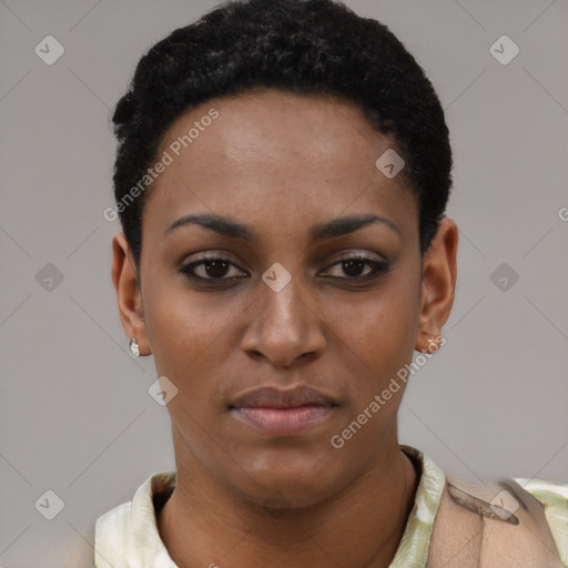 Joyful black young-adult female with short  black hair and brown eyes